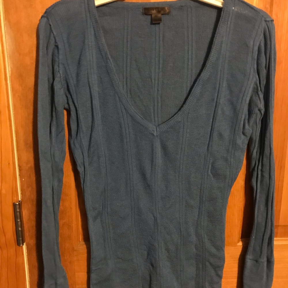 Long Sleeved V neck Bitten sweater. Size M